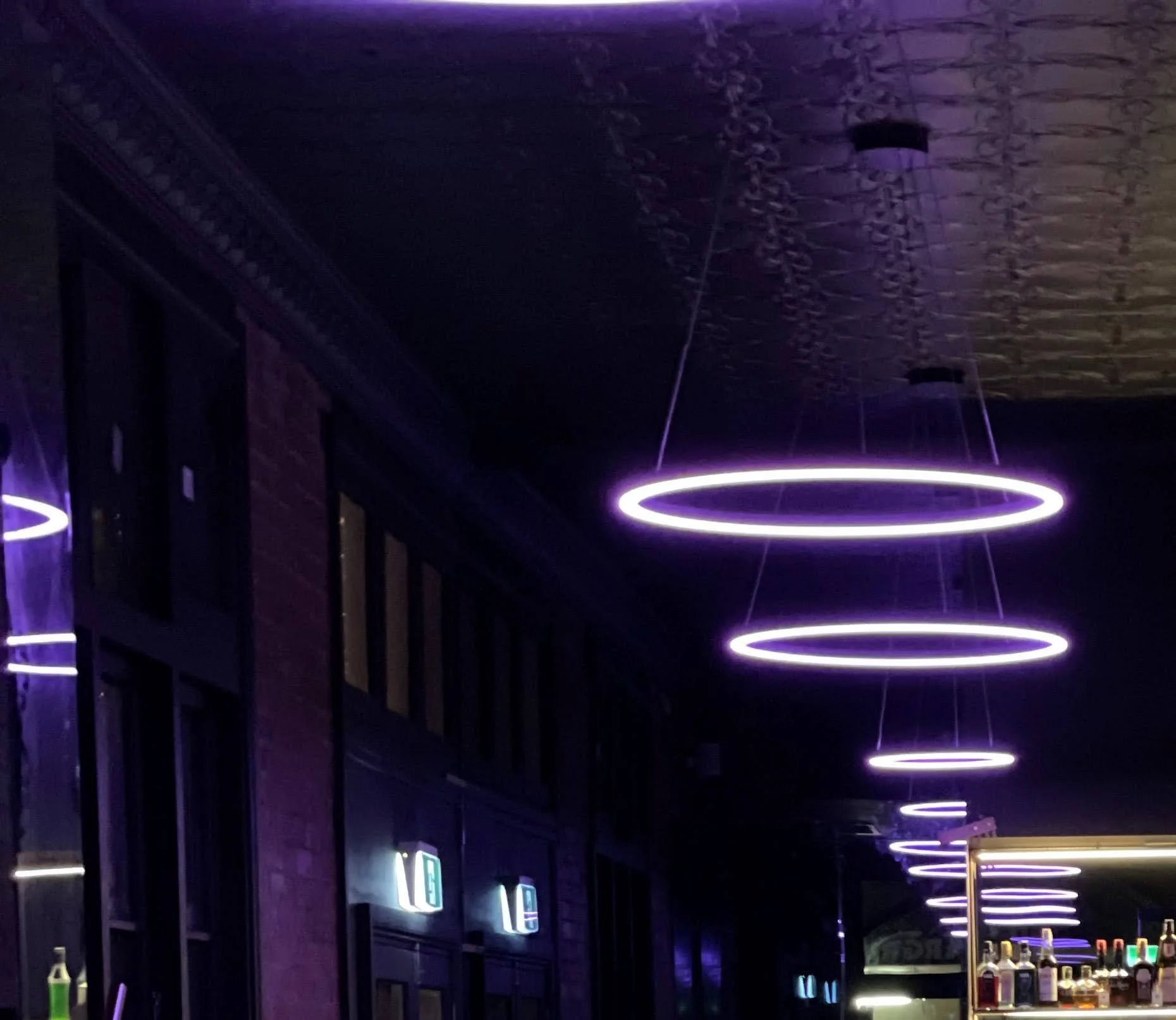 Purple ring lights above the Betel Boy bar